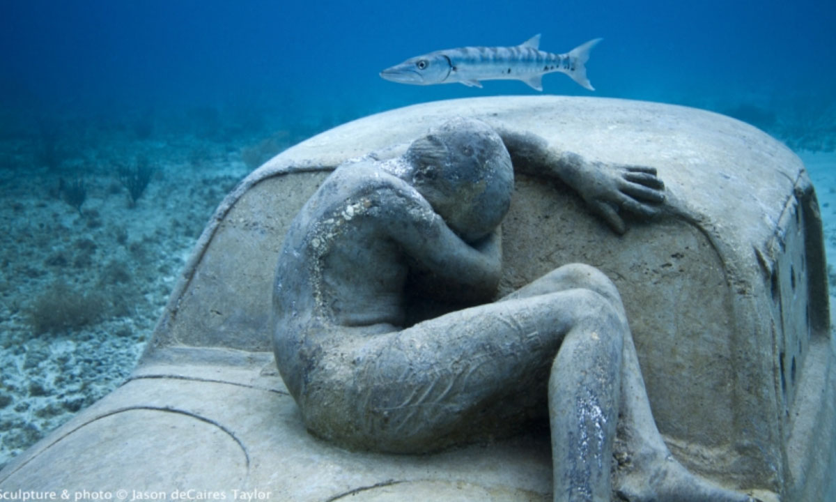statues at MUSA Cancun