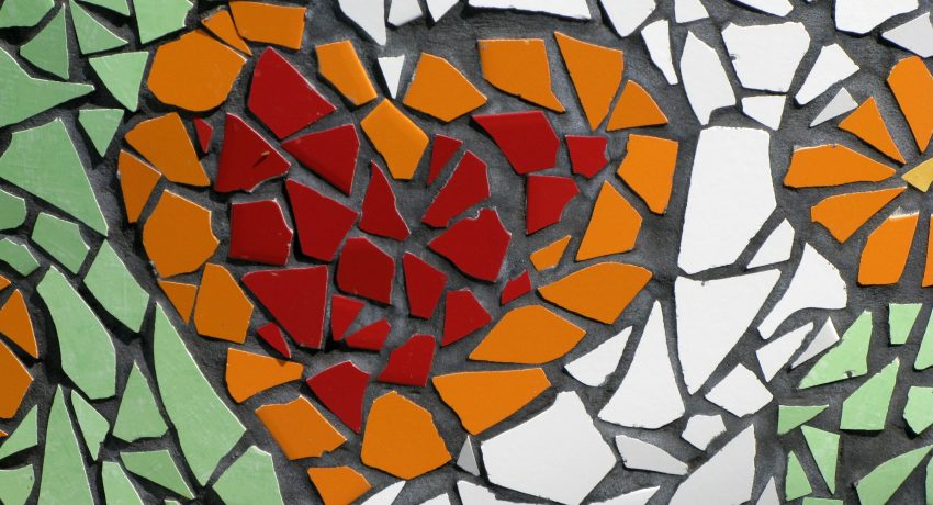 Selfmade colorful tiles mosaic with heart