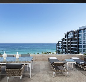 Large main terrace with a jacuzzi hot tub and hammock