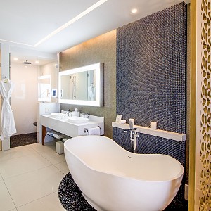 Divine bedroom with an eye-catching ensuite bathroom