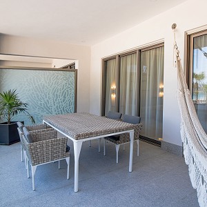 Large private terrace with furniture and hammock