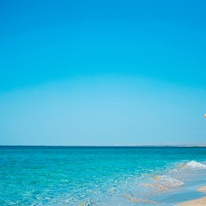 Woman walking on the Beach in Riviera Maya