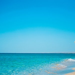 Woman walking on the Beach in Riviera Maya