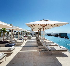 Photo gallery of the most luxury rooftop bar in Los Cabos. Amazing spot with an stunning infinity pool and expansive ocean views at Garza Blanca Resort.